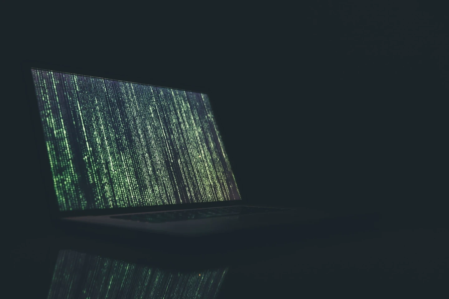 Laptop screen covered in lines of code Laptop screen covered in lines of code