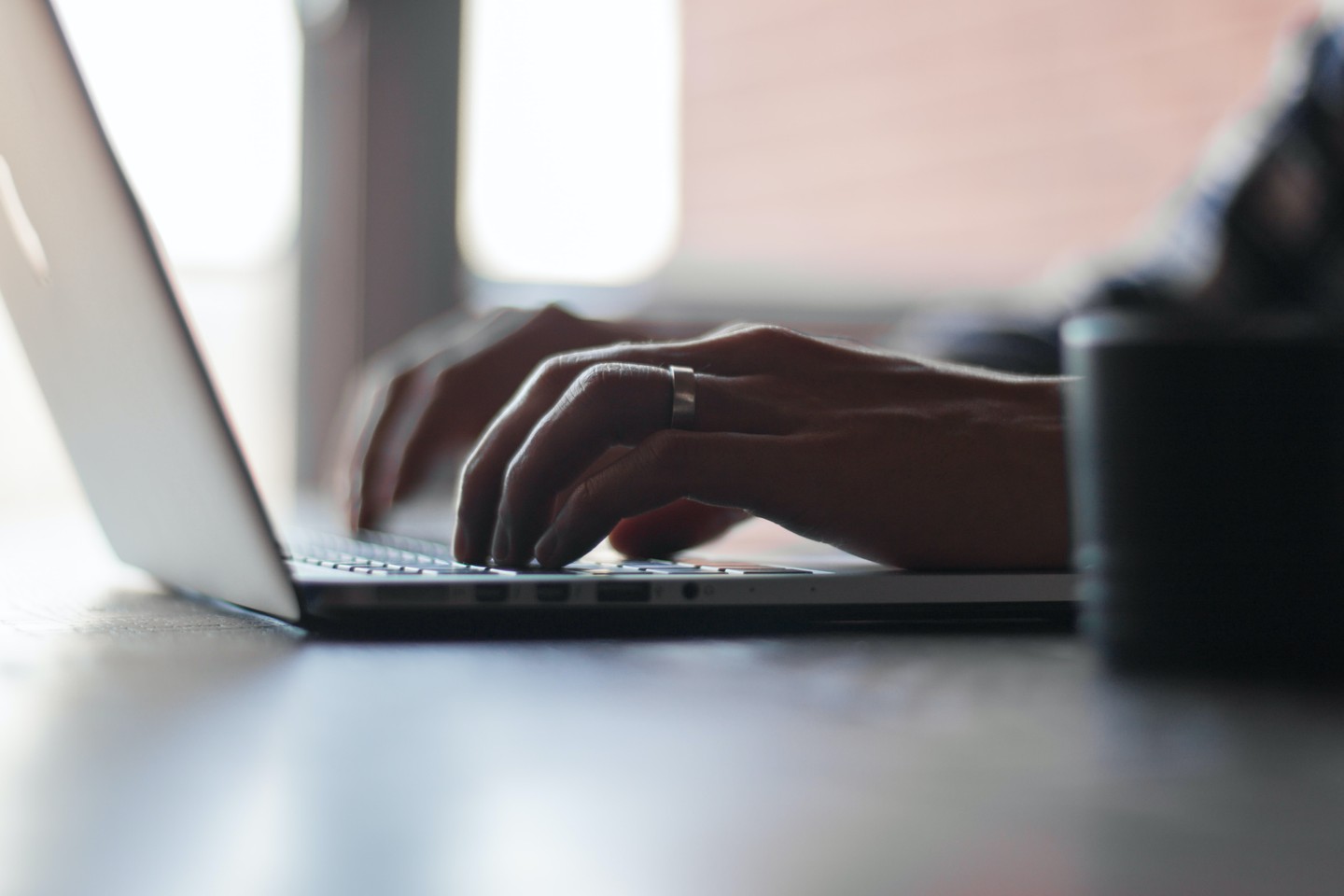 Person using a laptop. 