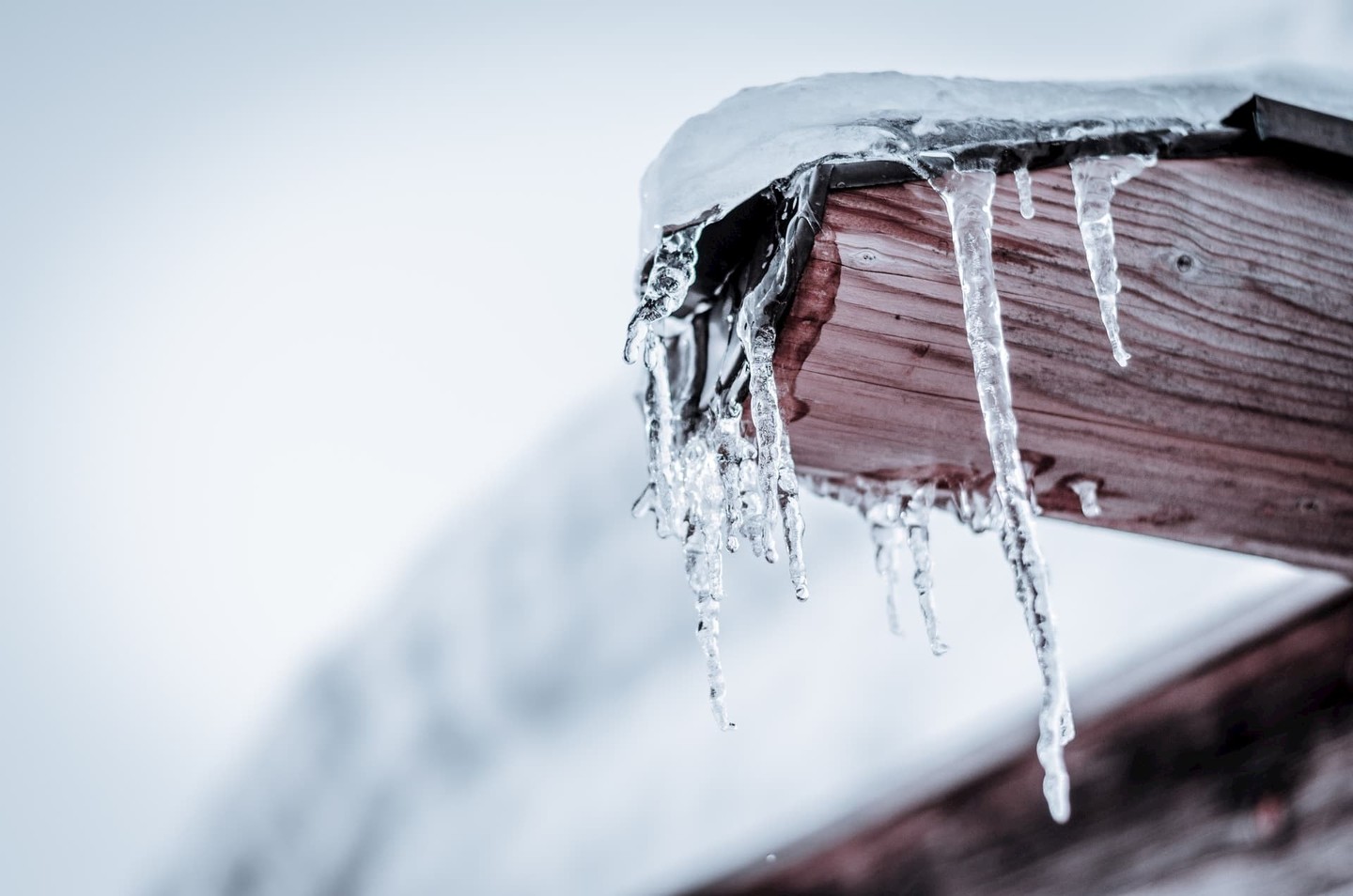 Frozen icicle on roof