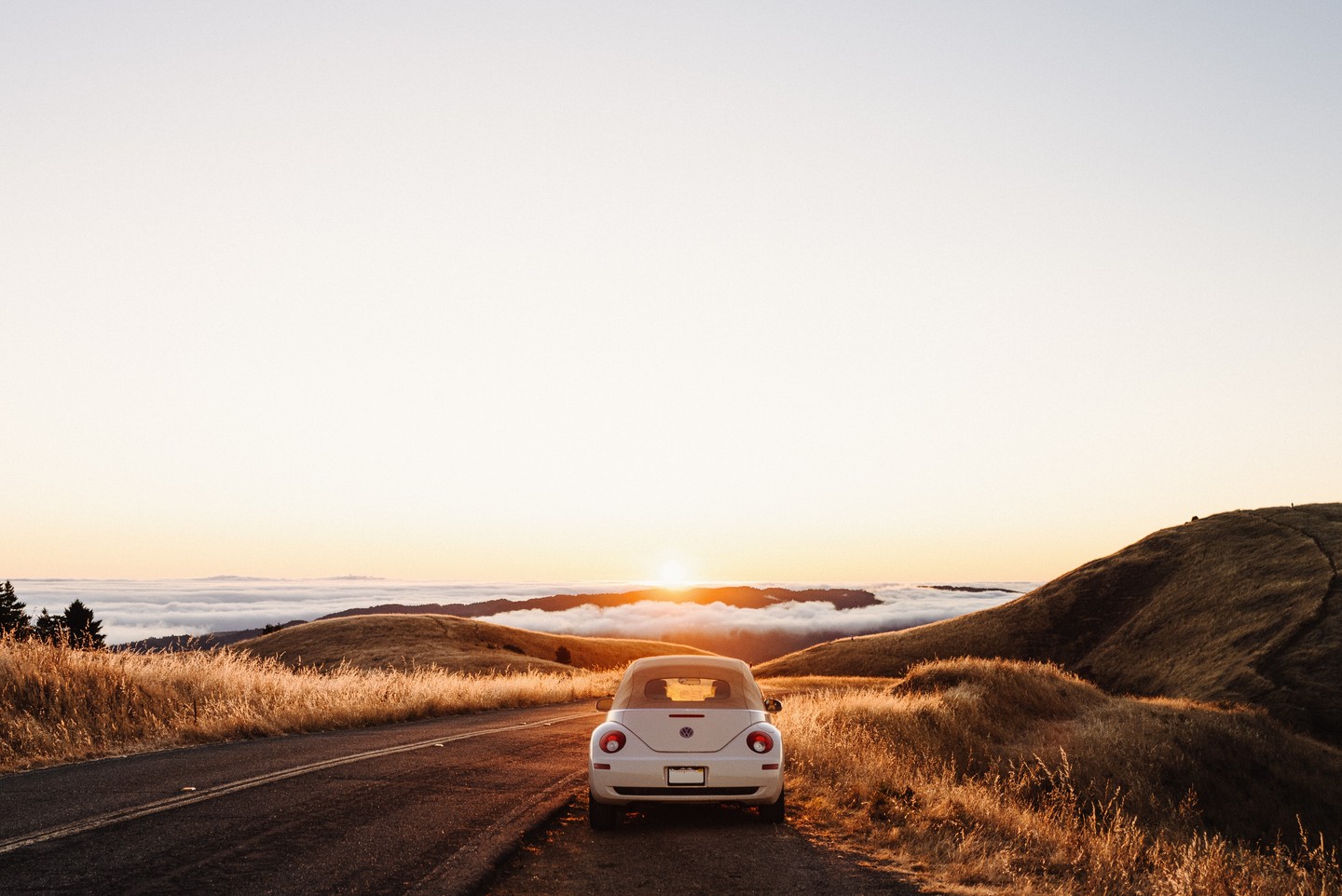 Car with a view of the sunset