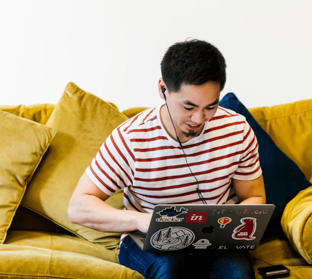 Person working on sofa