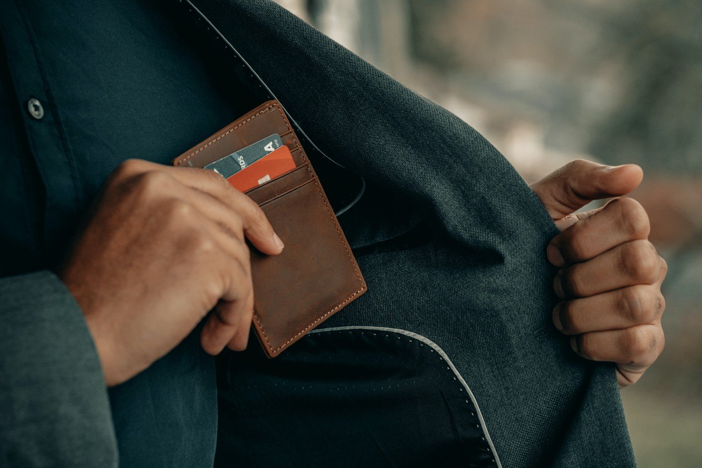 wallet with credit cards in a jacket pocket wallet with credit cards in a jacket pocket