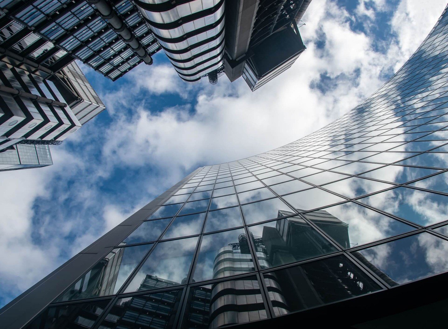 Worms eye view of glass buildings Worms eye view of glass buildings