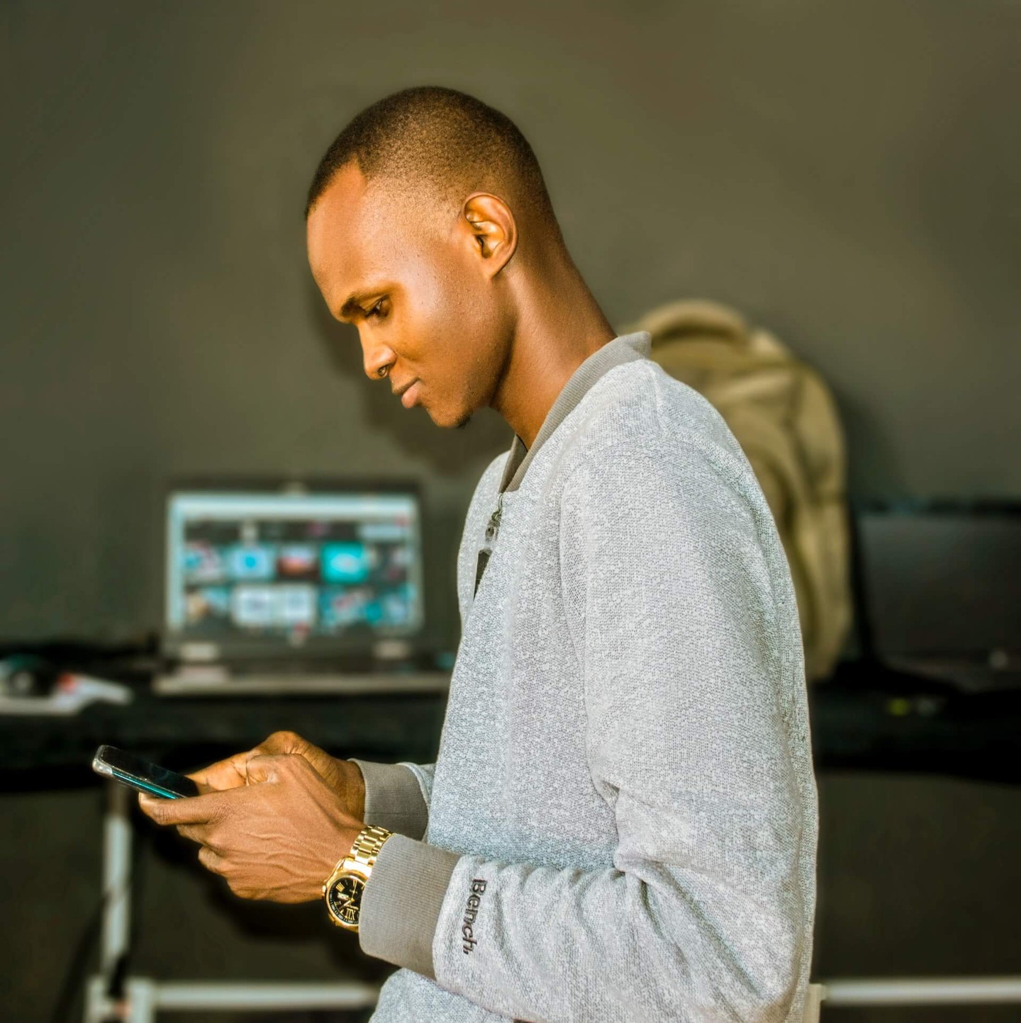 Man checking his credit score on his phone Man checking his credit score on his phone