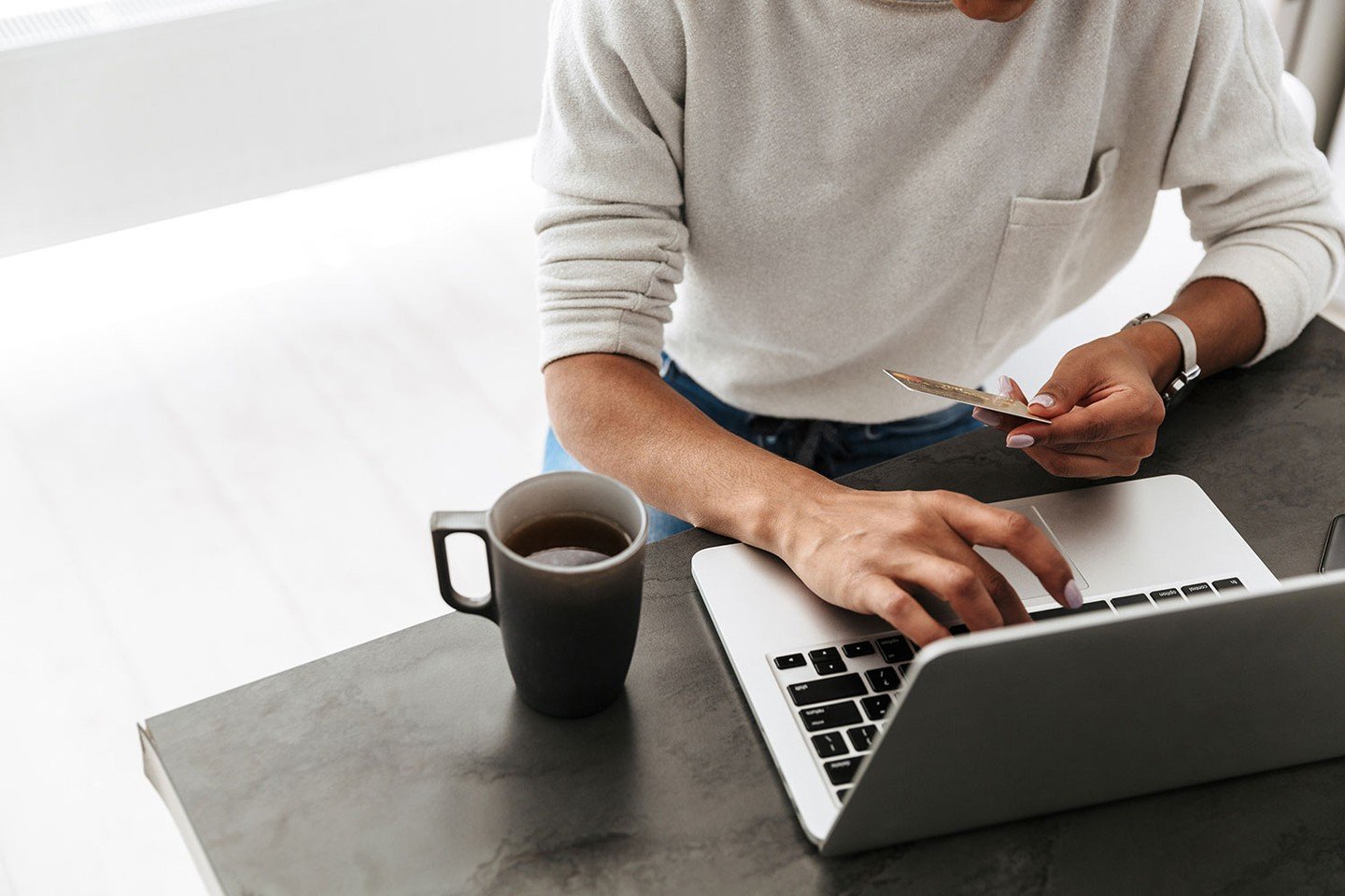 Using credit card near laptop Using credit card near laptop