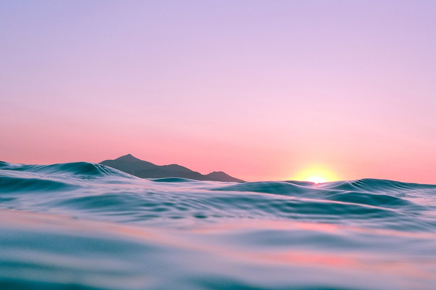 Calm body of water during golden hour Calm body of water during golden hour