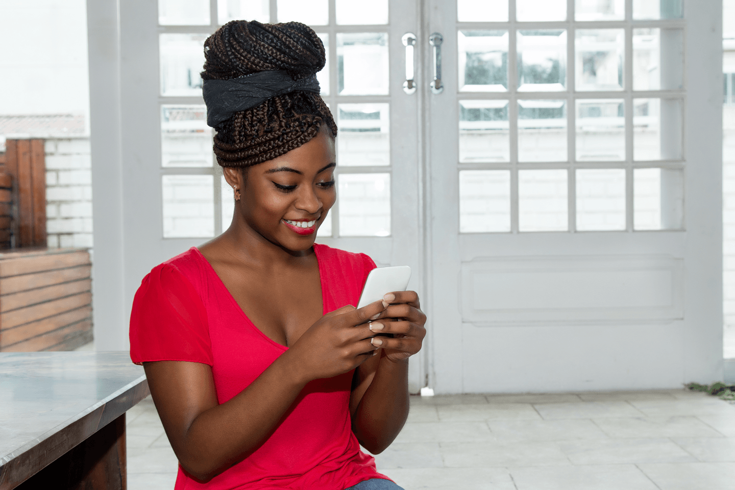 Woman looking at her cellphone. Woman looking at her cellphone.