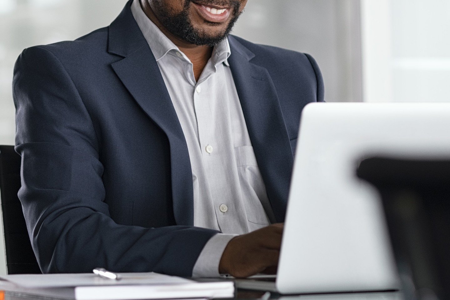 Man on laptop.