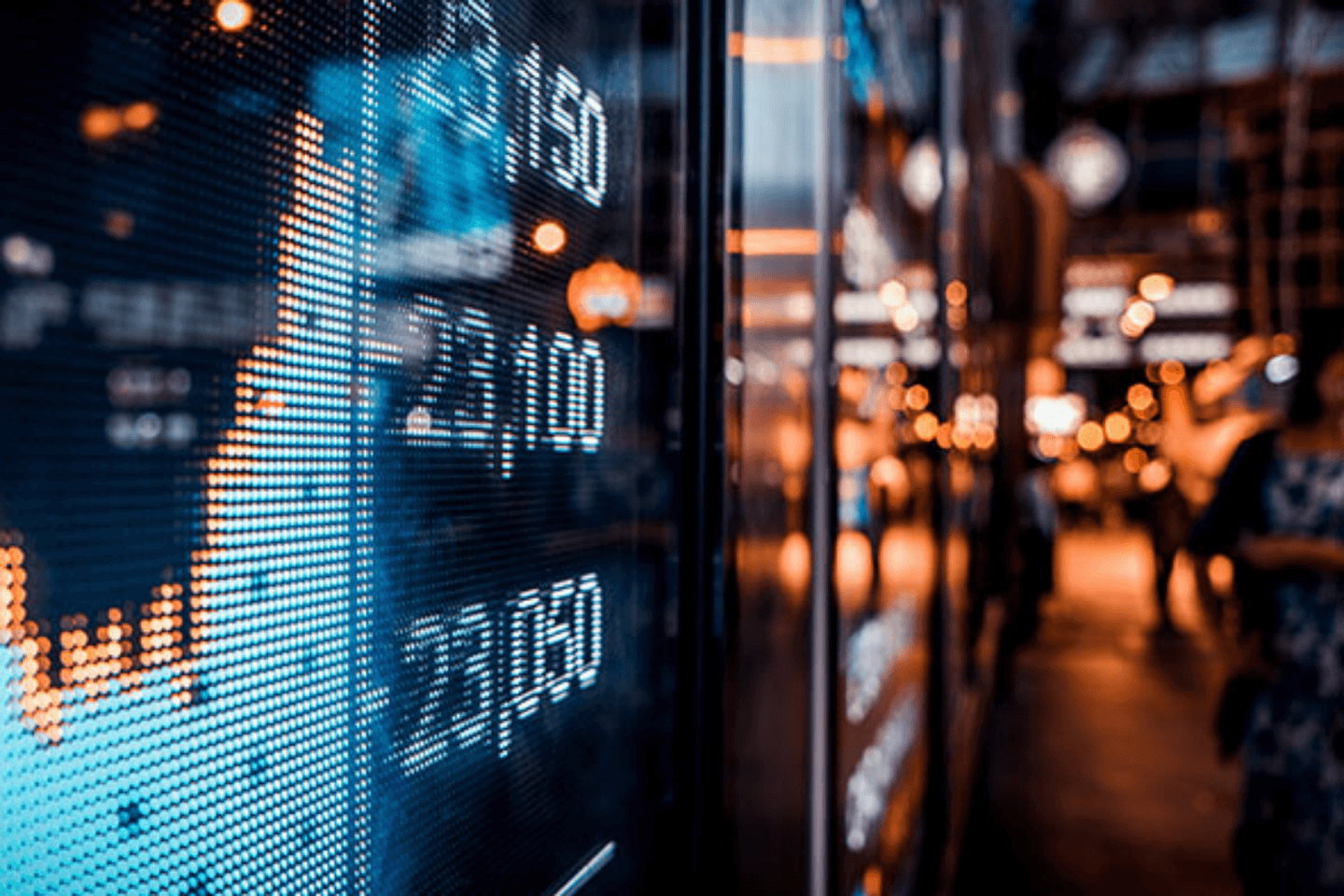 A screen that shows the stock market's performance A screen that shows the stock market's performance