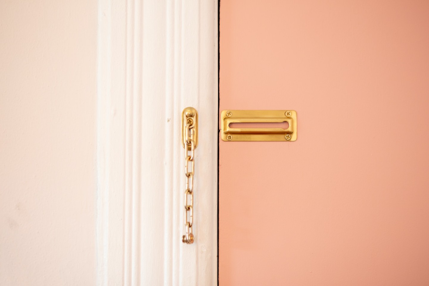 Pink door with gold lock