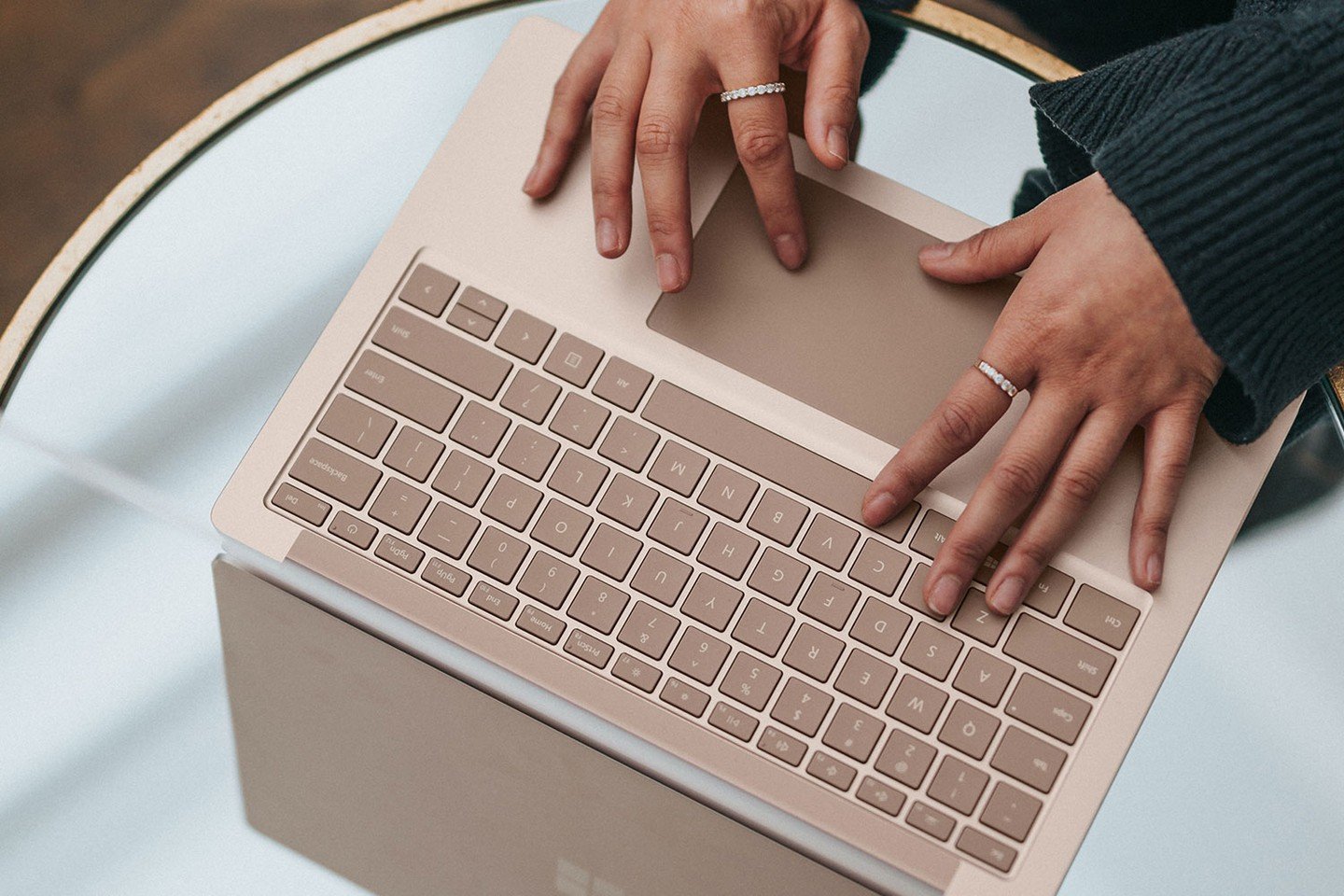 Girl typing on laptop