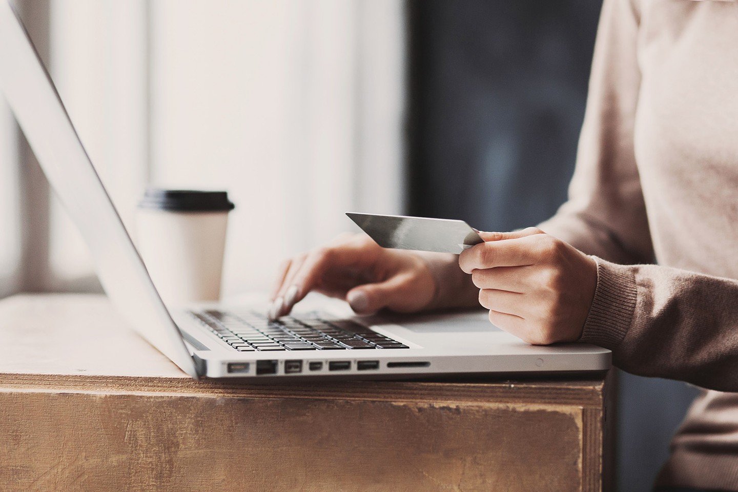 Online shopping and looking at credit card Online shopping and looking at credit card
